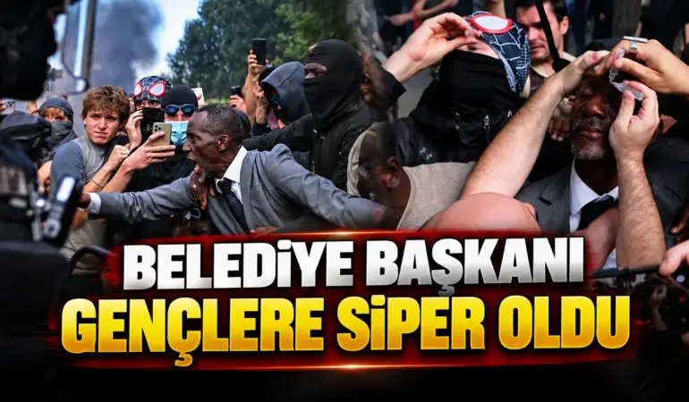 Fransa’da belediye başkanı polisin karşısına dikildi: Öğrencilere siper oldu!
